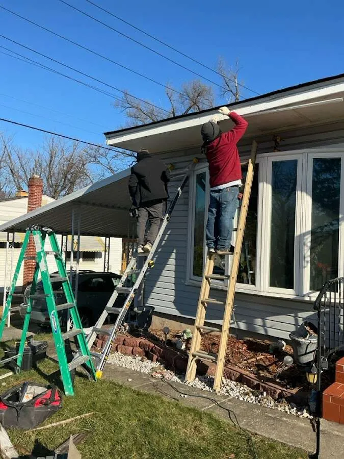 Restoration crew performing exterior repair in Denison